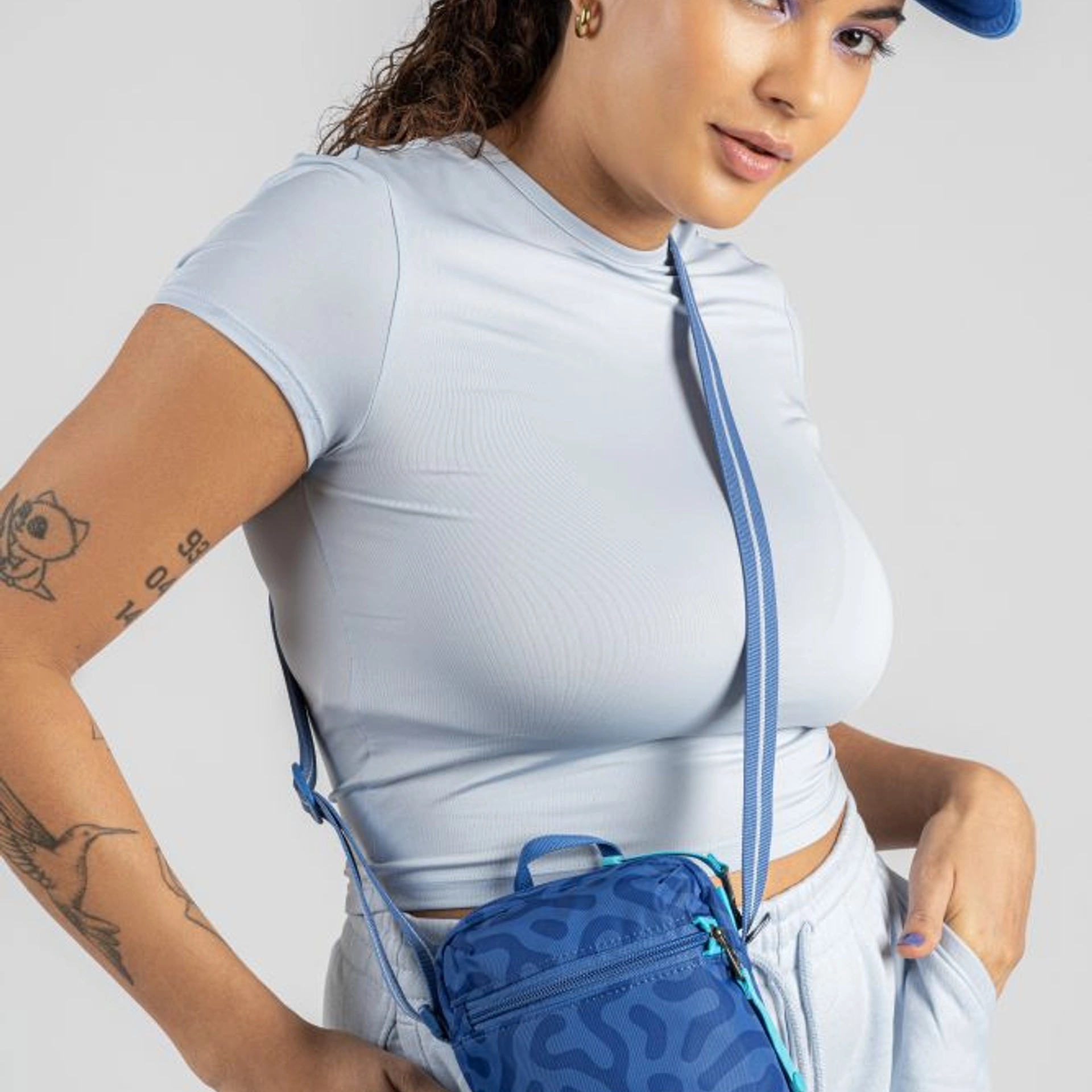 Сумка через плече антизлодій Pacsafe GO Micro Crossbody - Небесно-блакитний