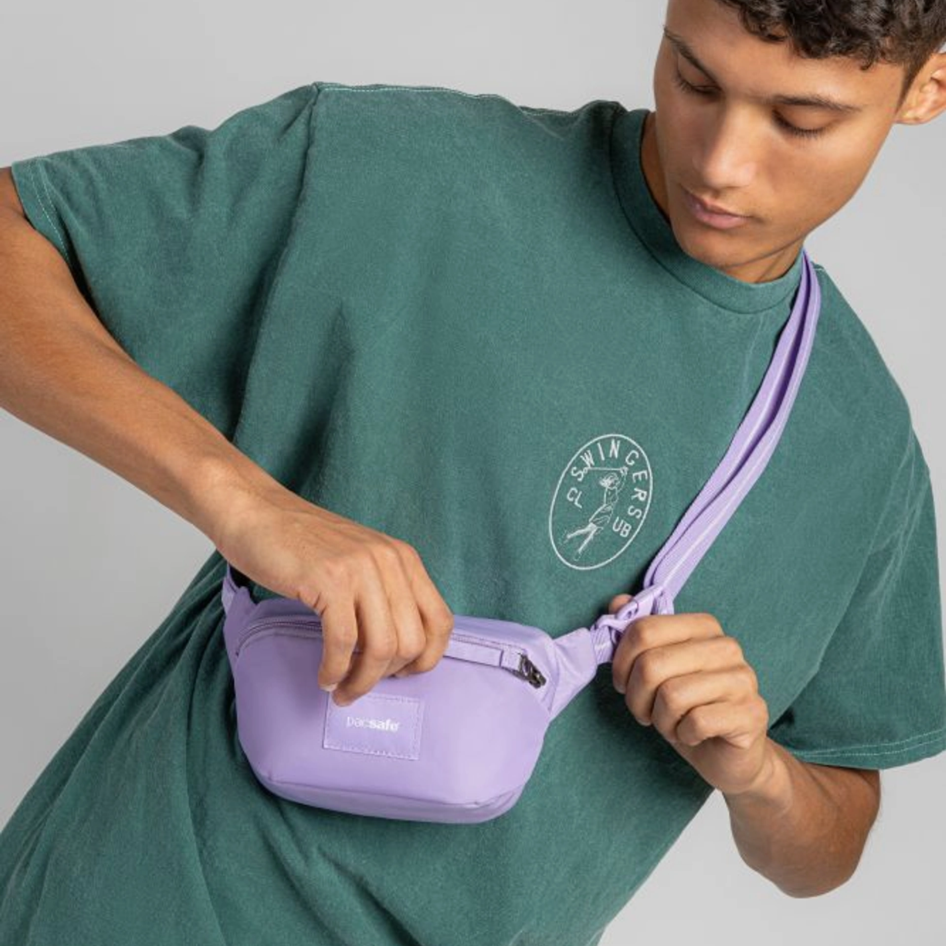 Сумка через плече антизлодій Pacsafe GO Micro Sling - Лавандовий